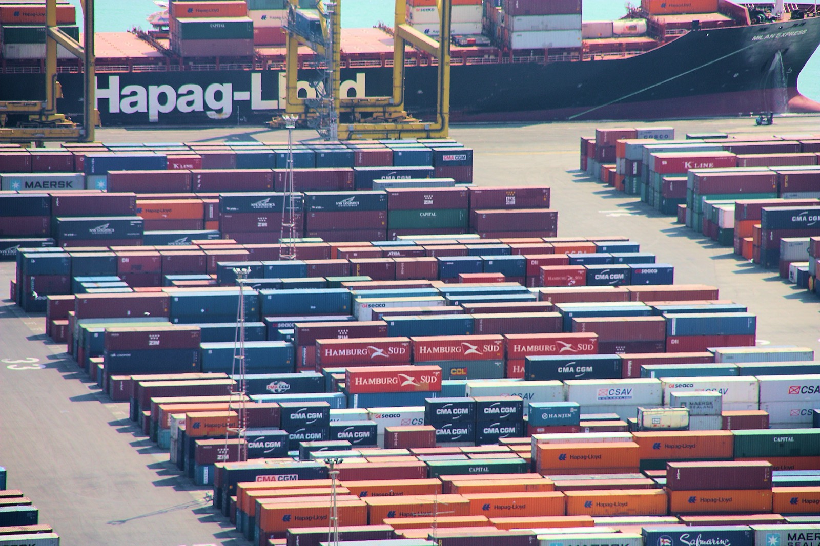 Container terminal at the Port of Valencia with gantry cranes at work