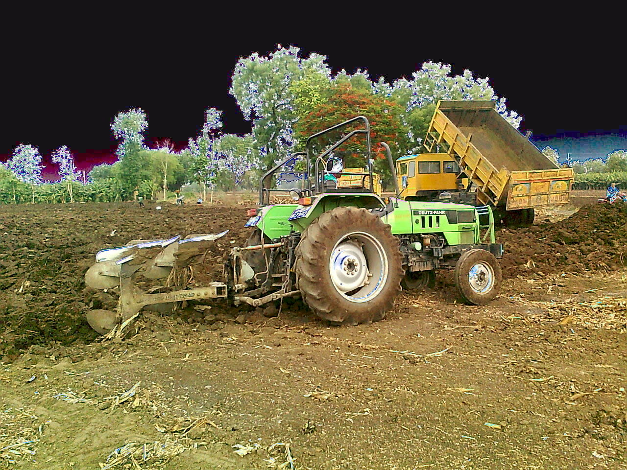 Row of Indian-made tractors lined up at a port ready for export